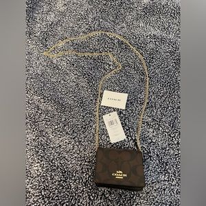 Coach Mini Wallet. Brown, with gold chain.